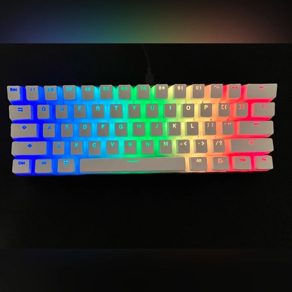 A keyboard (rk61) and keycaps (HK Pudding Keycaps)